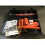 A cased kojack hydraulic caravan scissor jack and levelling aid.