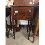 A mahogany pot cupboard.