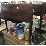 A mahogany pembroke table with card inside drawer for Lady Joan Cator.