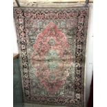 A small patterned rug approximately 144cm x 94cm