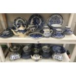 2 shelves of blue and white china.