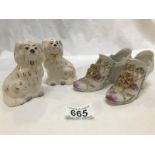 A pair of Royal Doulton miniature Staffordshire spaniels and a pair of porcelain shoes.