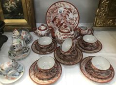 21 pieces of oriental 'geisha' fine porcelain china (chip on teapot and 1 plate) and a 12 piece
