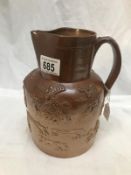 A large 19th century stoneware hunting jug.