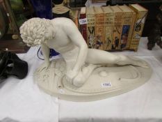A reconstituted marble figure 'The Dying Gaul'.