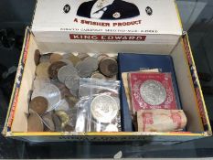 A large quantity of coins, foreign and commonwealth plus a thaler.