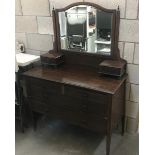 An Edwardian inlaid mahogany mirror back dressing table.