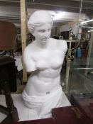 A Venus de Milo figure.