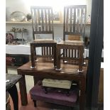 4 rustic dining chairs and a dining table.