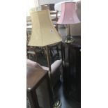 A brass effect standard lamp and 1 other.