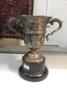 A silver trophy on stand inscribed "Sheffield Telegraph Golf Cup 1932", hall marked Walker and Hall,