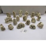 18 Oriental resin figures including some erotic.