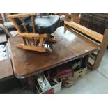 A Victorian mahogany extending wind out table, no leaf or handle.