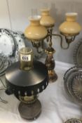 A branch oil lamp style electric table lamp and 1 other.