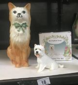 A boxed Regency Fine Arts West Highland terrier and a china model of a ginger cat.