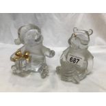 2 Lenox crystal Winnie the Pooh figures, one with a Christmas hat and present,