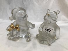 2 Lenox crystal Winnie the Pooh figures, one with a Christmas hat and present,