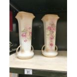 A pair of rose decorated vases marked E.W.S Longton.