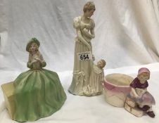 A figure of mother with child, a figure of a lady and a figural posy bowl.