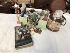 A large box of costume jewellery, watches, and a jewellery stand etc.