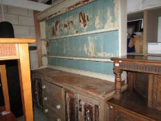 A large old pine dresser.