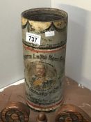 A heavy, decorated cannon shell case.