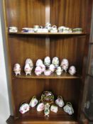 A collection of china trinket boxes and other china ware.