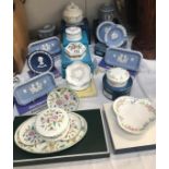A quantity of Wedgwood, Royal Doulton, Minton and Coalport mostly boxed.
