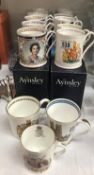 A quantity of Aynsley commemorative tankards, mostly boxed.