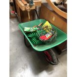 A wheel barrow and contents.