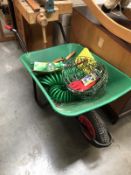 A wheel barrow and contents.