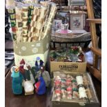 A quantity of Christmas decorations including wrapping paper & figures etc.