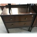 An Edwardian oak 2 drawer chest.