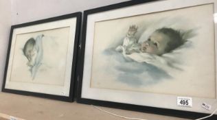 2 vintage framed and glazed baby prints.