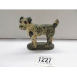 A 1930's cold painted bronze terrier stamped 'Chorus Brand, London'.
