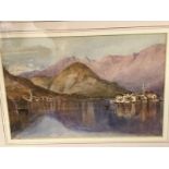 A framed and glazed watercolour of mountains and lake.