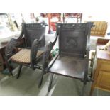 A pair of carved 'Glastonbury' chairs.