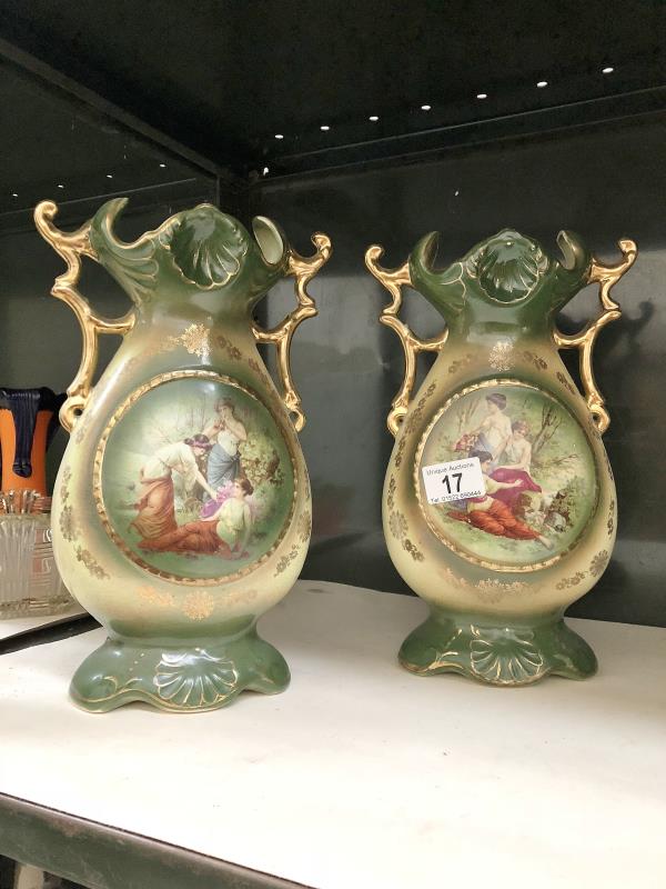 A pair of 19th century Staffordshire vases.