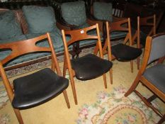 A set of 4 Danish Hans Wegner Carl Hanson chairs.