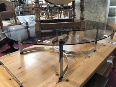 A smoke glass top coffee table.