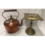 A large Victorian copper kettle with brass trivet.
