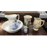 A blue and white jug and bowl, a Price Bros jug and a floral vase.