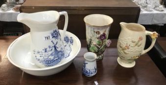 A blue and white jug and bowl, a Price Bros jug and a floral vase.