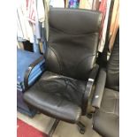 A black leather office chair.