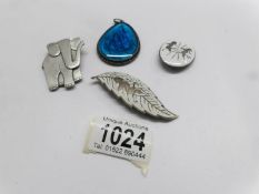 2 Siam silver brooches, a blue pendant and an elephant brooch.