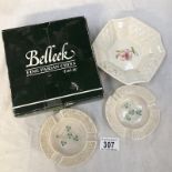 A boxed Belleek fine parian china square dish and 2 round Belleek ashtrays.