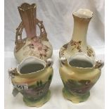 A pair of vases decorated with cottages, a Crown Devon vase and 1 other.