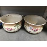 A pair of Staffordshire chamber pots.