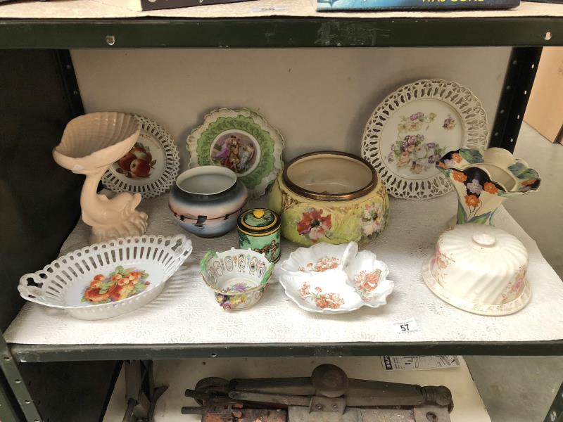 A mixed lot of ceramics including dishes, plates, cheese dish etc.