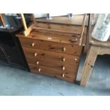 A pine 4 drawer chest of drawers.